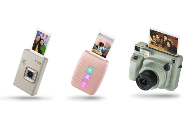 the three instax cameras and connected printers