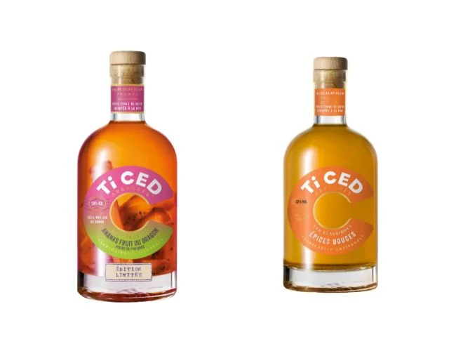 deux bouteilles de rhums arrangés Ti CED